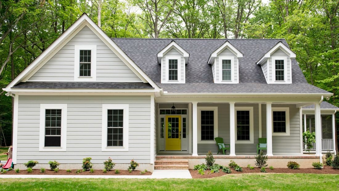 Close up of a house with a garden.