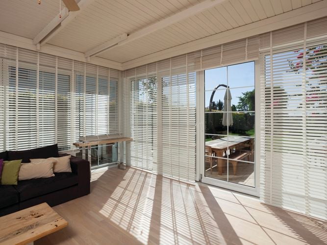 White venetian blind shutters