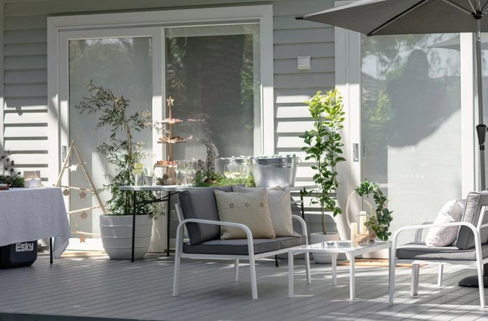 Decking with outdoor area and umbrella.
