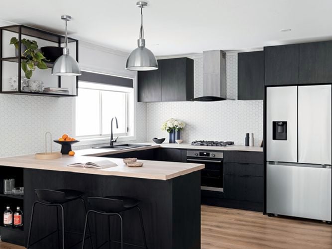 Black n White kitchen with silver overhead lights