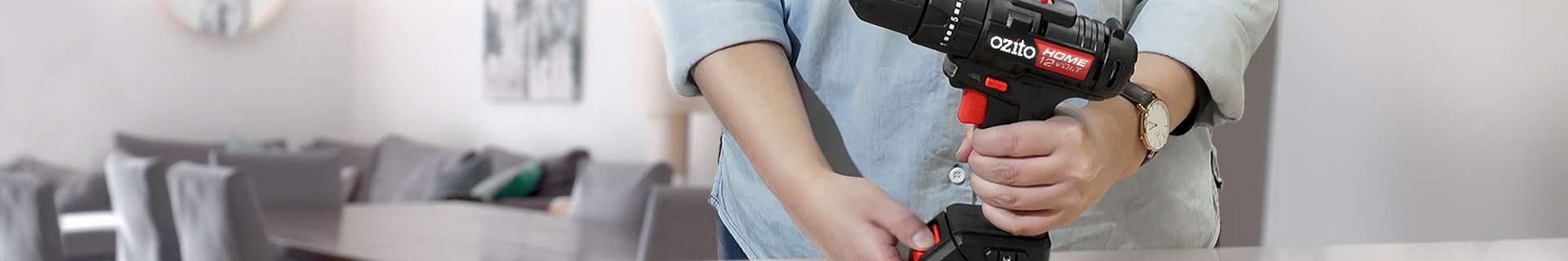 Person holding drill