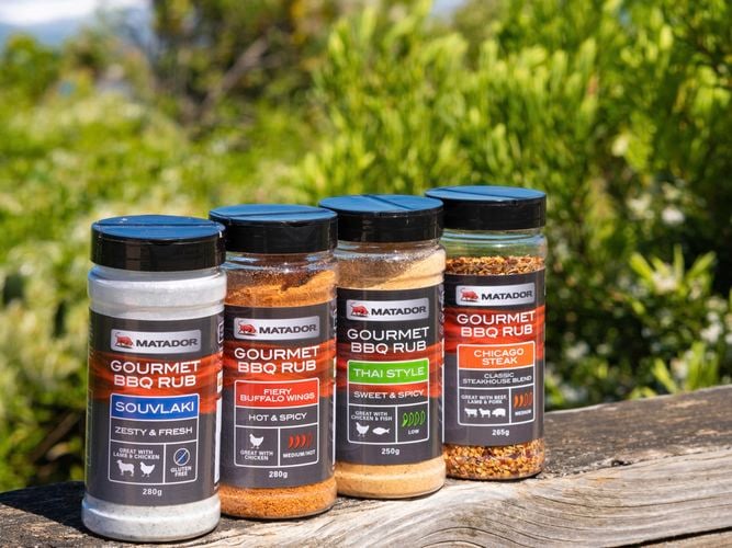 Matador gourmet BBQ rubs with the ocean in the background.