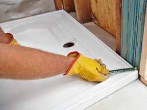 DIY Step Image - How to install a shower base . Blob storage upload.