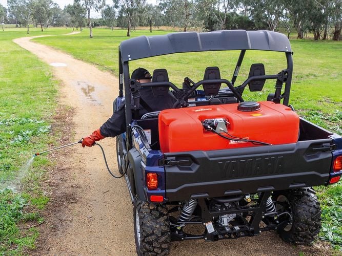 Silvan Tank on atv being used on path 