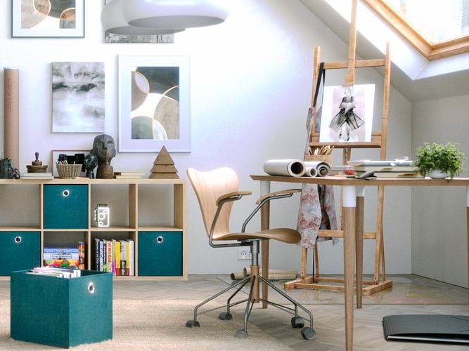 Cube shelving unit, easel with a picture on it and a chair in a room