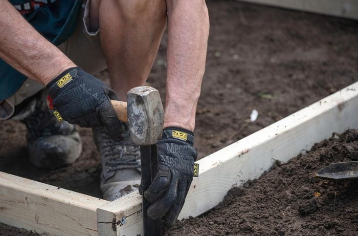Place steel pickets to brace the timber