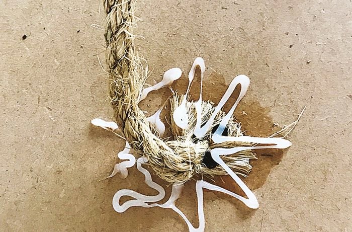 Adhesive applied at the end of the sisal rope and the centre of the top circle cut-out.