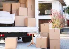 Packing boxes on a truck with table