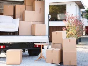 Packing boxes on a truck with table