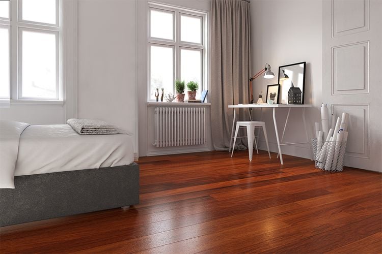 White bedroom with bed and timber-look flooring