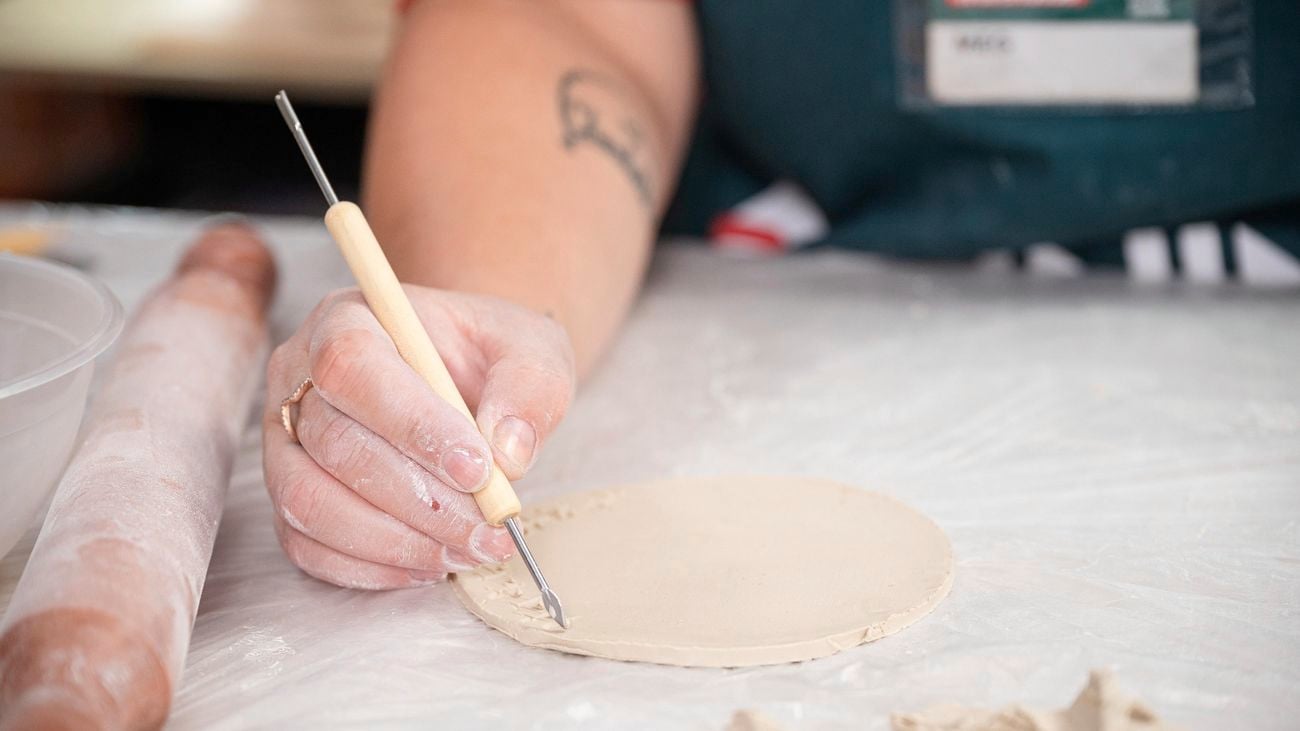 A bunnings team member scoring outside of base.