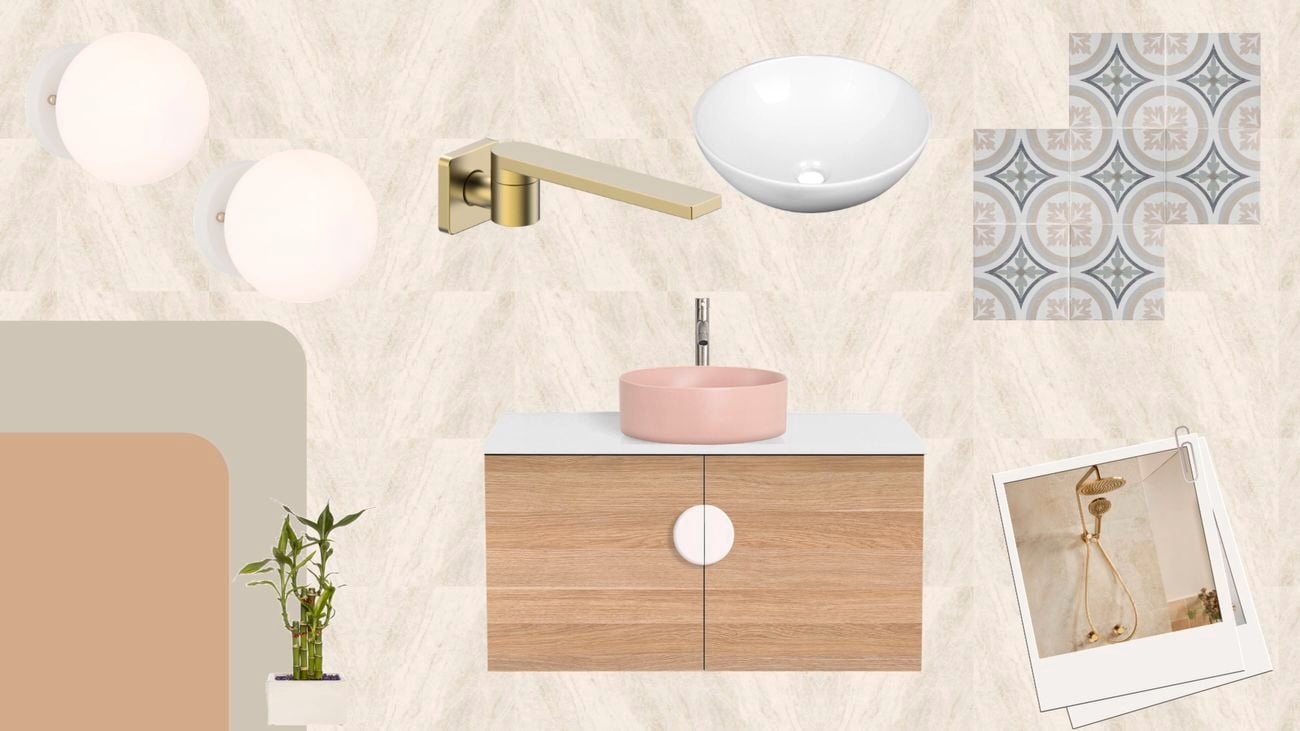 Bathroom mood board featuring light stone-look tiles, a timber vanity with a pink vessel basin, brass tapware, decorative patterned tiles, globe wall lights and indoor greenery.