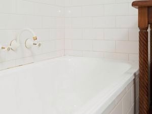 Freshly painted white bathtub