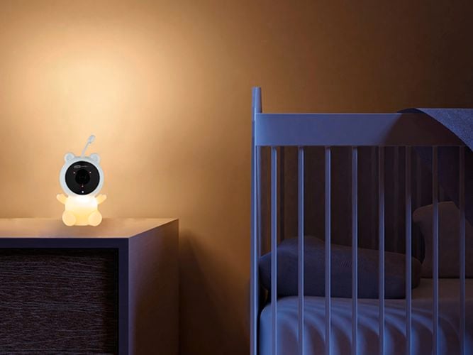 Smart Night light Camera next to a bed