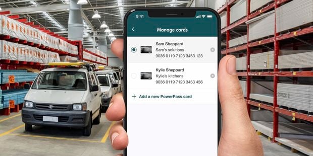 PowerPass app swap cards screen open on a smartphone in store