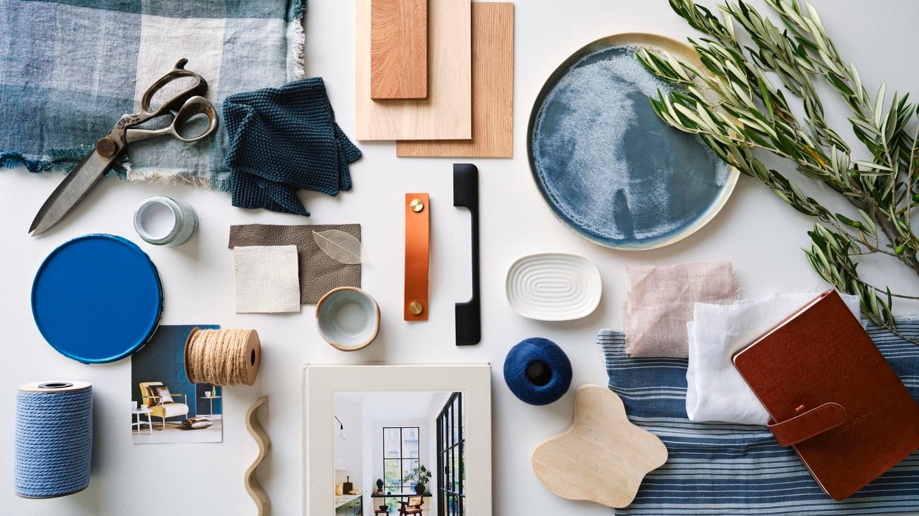 Blue and neutral colour palette moodboard - flat lay featuring calm blue, timber and neutral paint swatches, textiles and product samples.