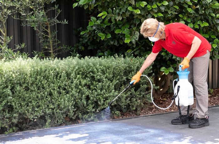 Apply a second coat of sealer to pavers