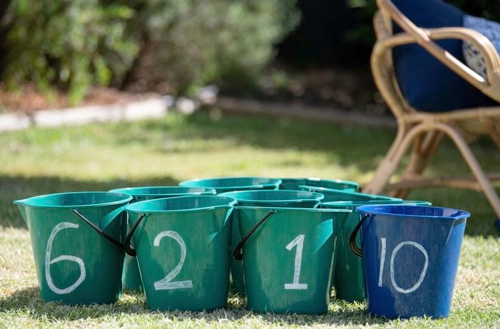 Buckets with numbers on them.