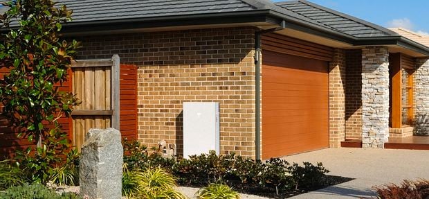 Row of houses with Tesla Powerwalls
