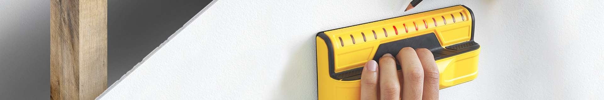 Stud finder on wall