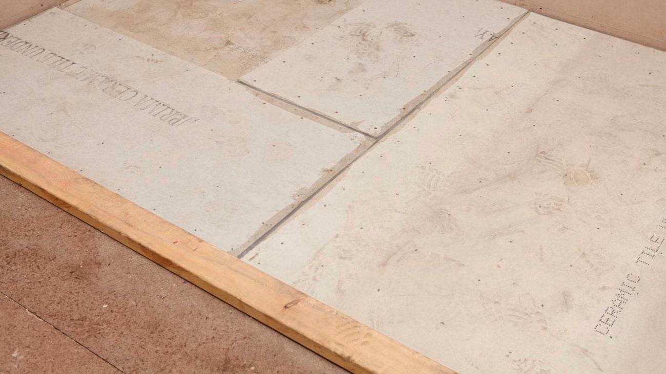 A closeup of underlay during a flooring installation on a jobsite.