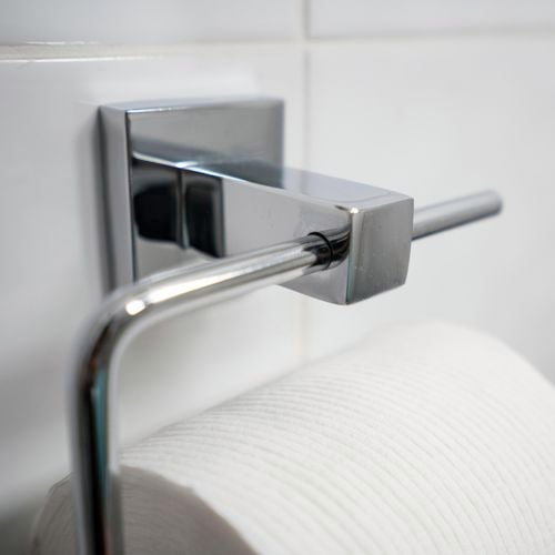Square chrome single toilet roll holder with toilet paper attached