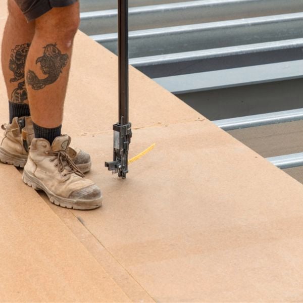 Structaflor image of the flooring being laid on a building site