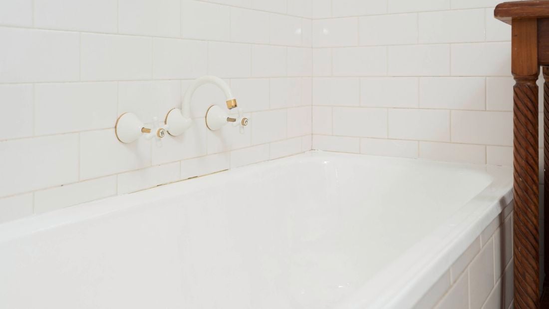 Freshly painted white bathtub