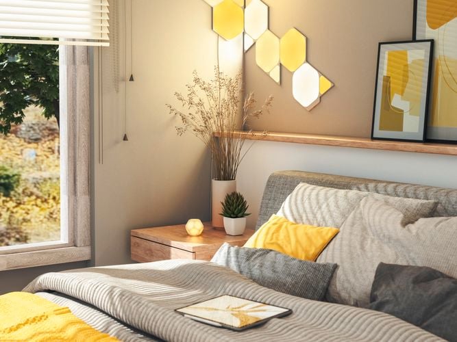 11 smart light panel layout mounted onto the walls in a bedroom.