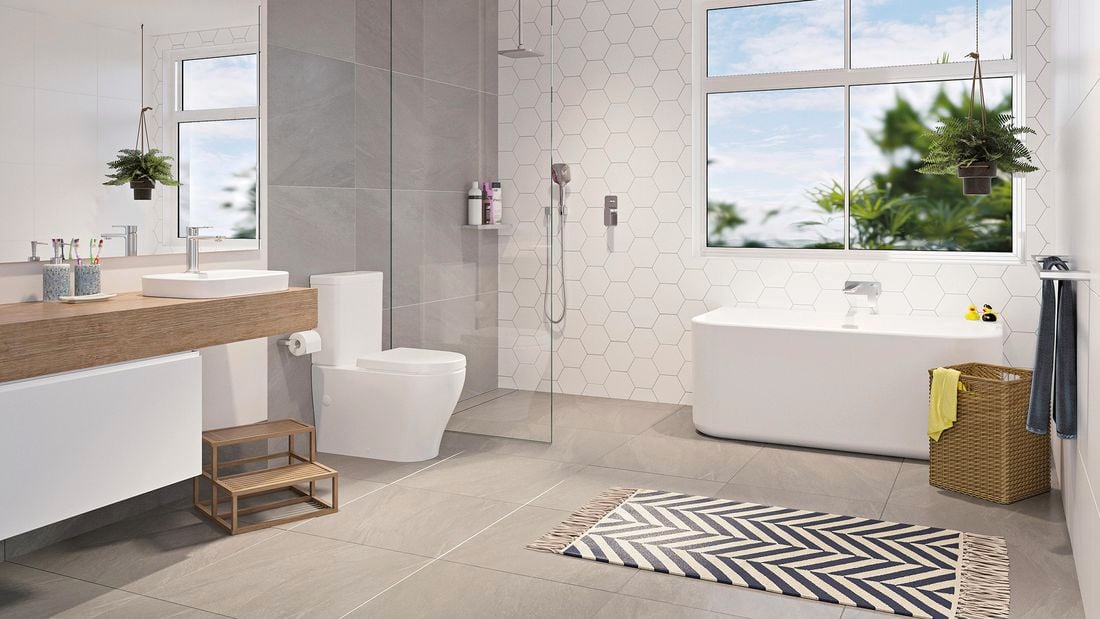 A warmly lit white backroom with wooden countertops, woven basket