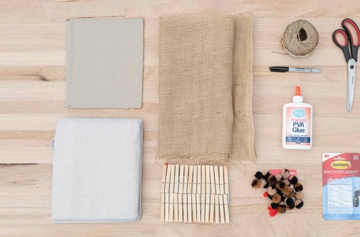 hessian, twine, marker and scissors on a table