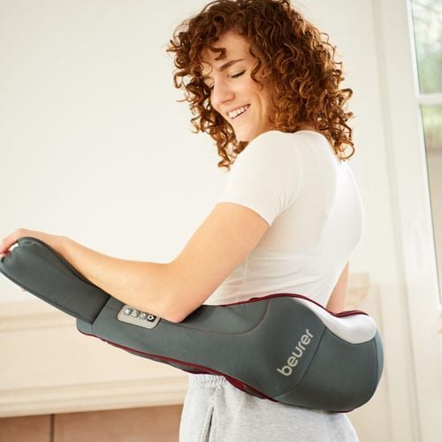 A lady has a heat pack around her waist