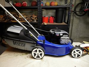 DIY Step Image - How to maintain a lawn mower . Blob storage upload.