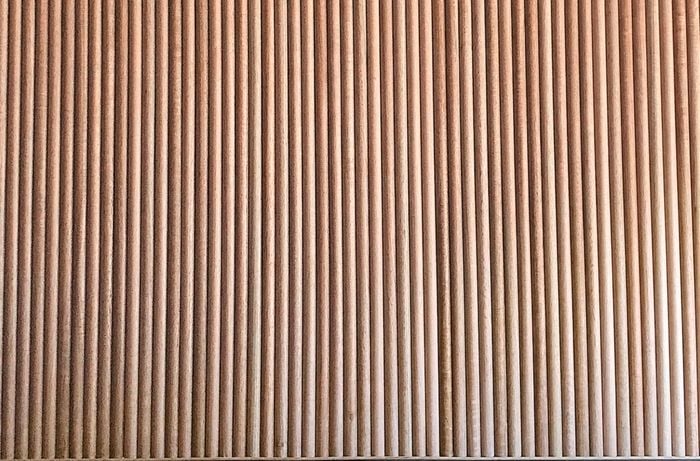 A panel made up of vertical lengths of dowel