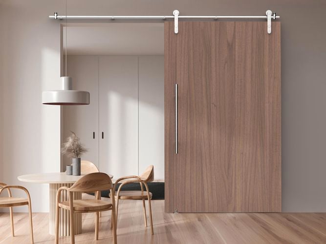 Dining room interior featuring Rolltrak Stainless Steel Round Side Mount Barn Door Track, 600mm Stainless Steel Round Single Pull Handle and Stainless Steel Barn Door Guide.