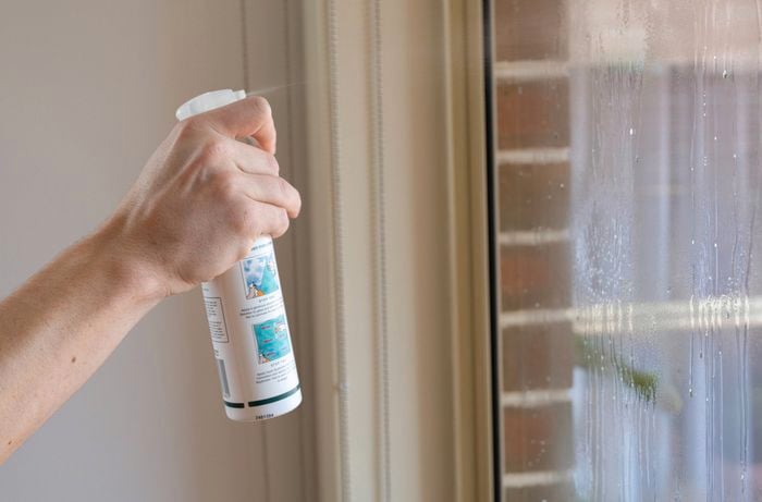 Spray the window with window film application solution before applying the film