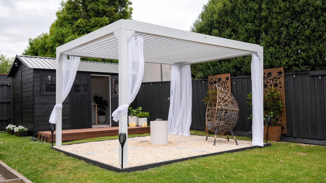 outdoor space with sheer curtains, egg chair