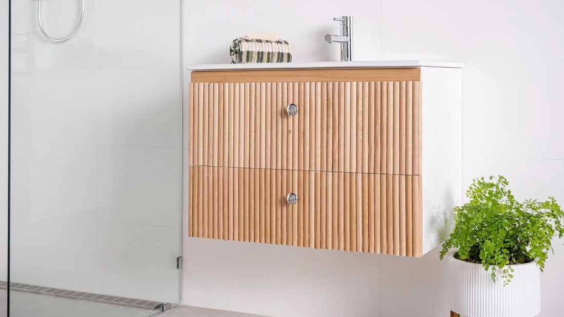 A finished vanity with dowel front panel