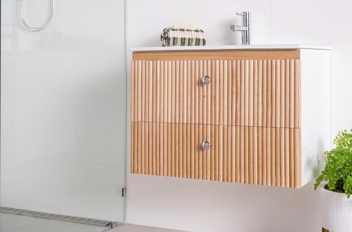 A finished vanity with dowel front panel