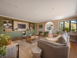 living room with couch and tables