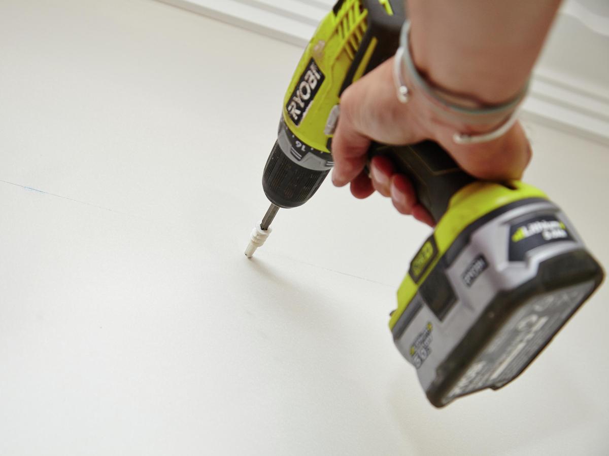 How To Hang a Picture Frame From a Track - Bunnings New Zealand