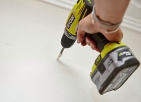 DIY Step Image - How to hang a picture frame from a track . Blob storage upload.