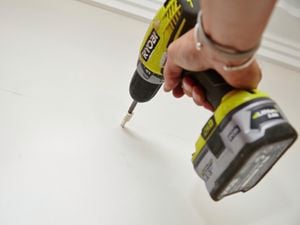 DIY Step Image - How to hang a picture frame from a track . Blob storage upload.