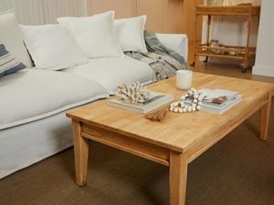 A newly restored timber table in living room.