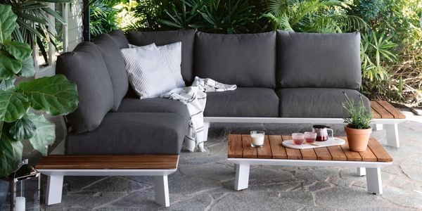 Outdoor six seats corner couch and coffee table.