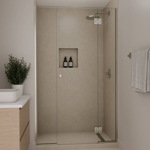 Frameless alcove shower screen in brushed nickel finish with clear glass and minimalist bathroom styling.