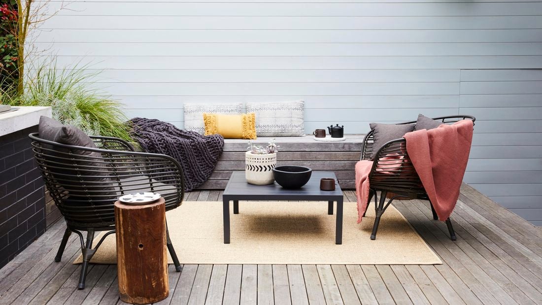 Outdoor deck with furniture.