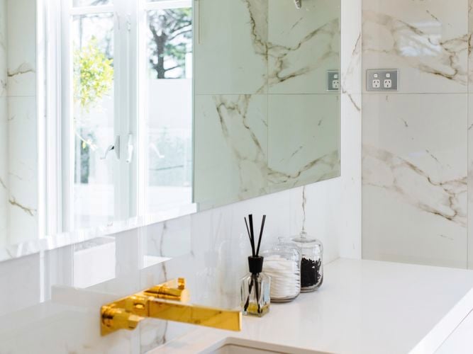 Marble tile with Gold taps 