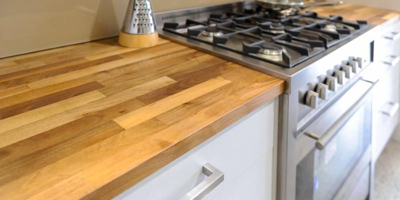 Timber benchtop, stove and oven.