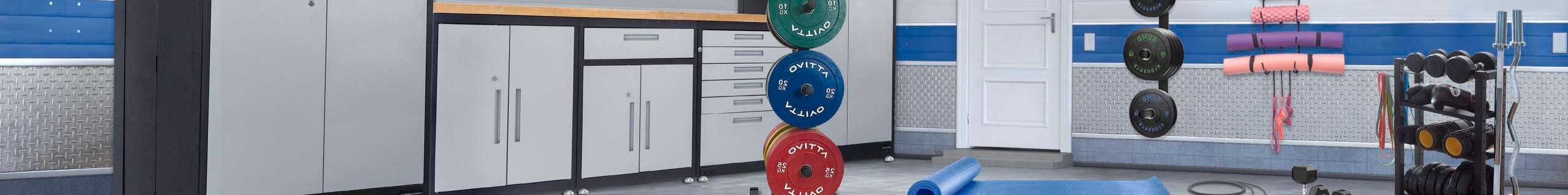 Gym equipment stored in cabinets and fitness racks.